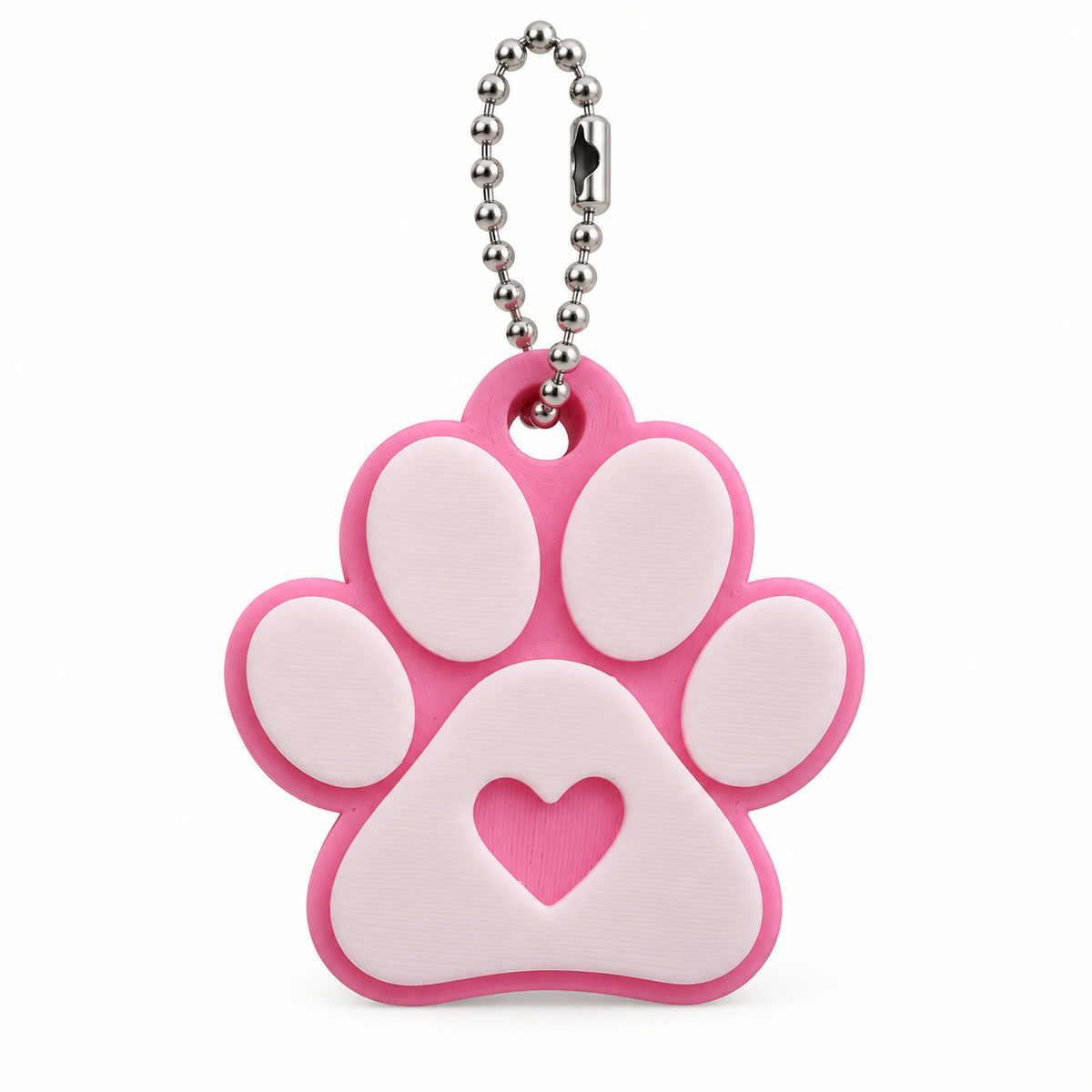 Pink and white paw print keychain with heart detail and silver ball chain
